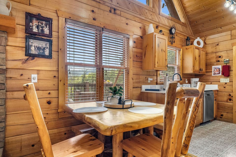 Dining table open to living room & kitchen
