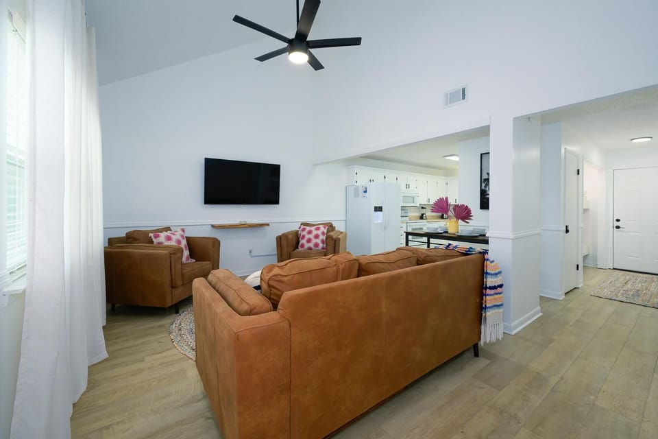 Vaulted ceilings greet you in the main living area!