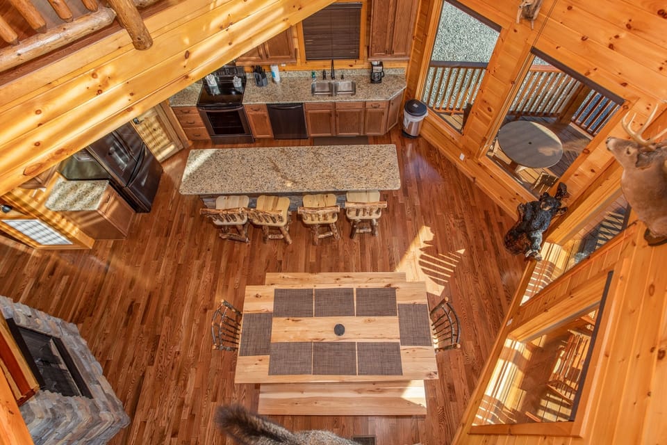 A Beautiful View Looking Down into the Dining and Kitchen Area