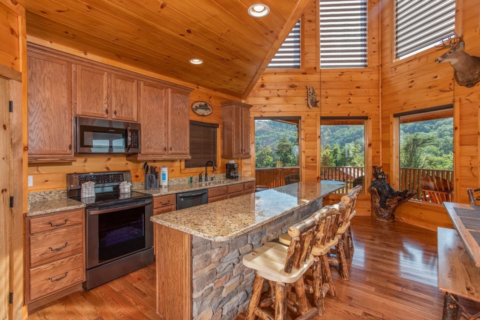 Kitchen with Stainless Appliances and Counter Seating for Four