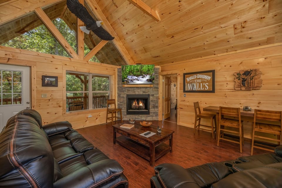 Living room with stone fireplace