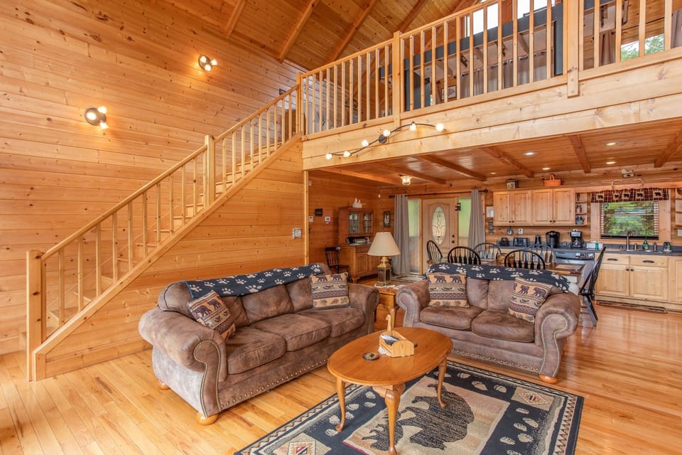 Living room sofas by stairs