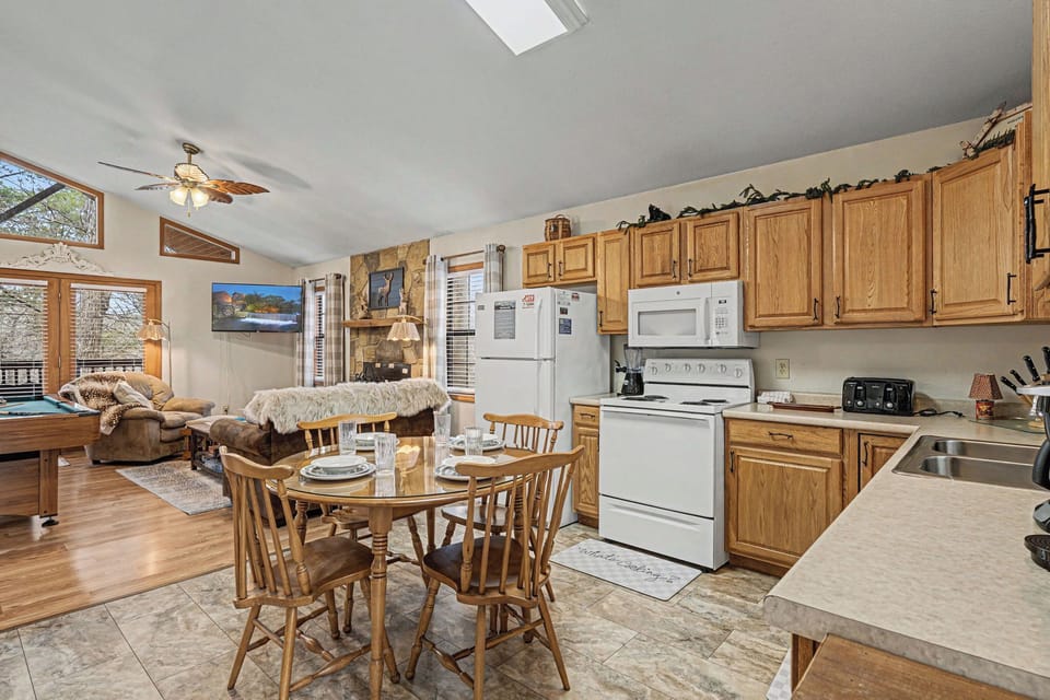 Your open-concept retreat blends kitchen, dining and living spaces seamlessly, creating the perfect gathering spot for memorable meals together.