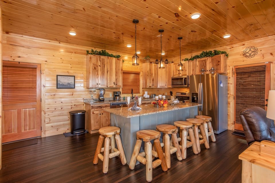 Kitchen with island and bars tools