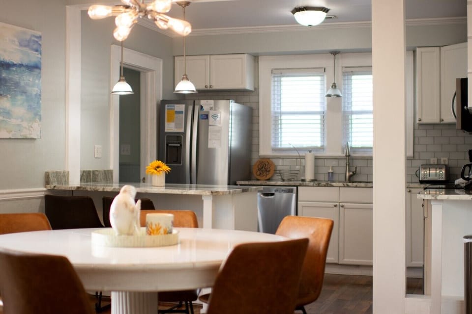 Dining and kitchen with laundry and full bath around the corner!