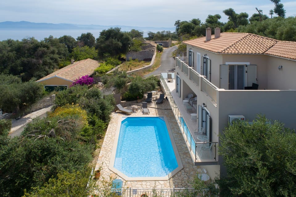 Capture the villa%27s charm from a birds%2Deye perspective%2E