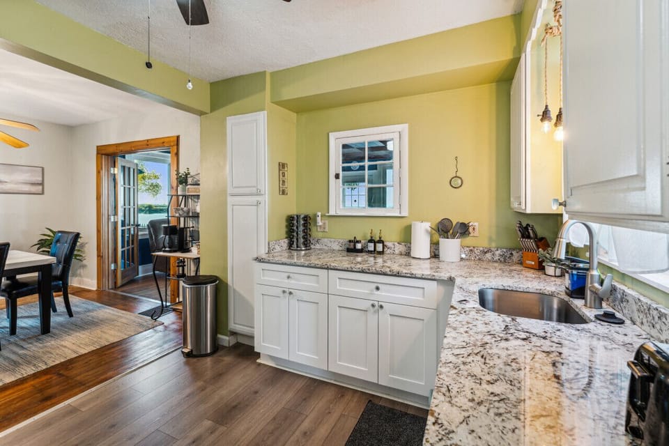 Fully Stocked Kitchen next to Dining Room