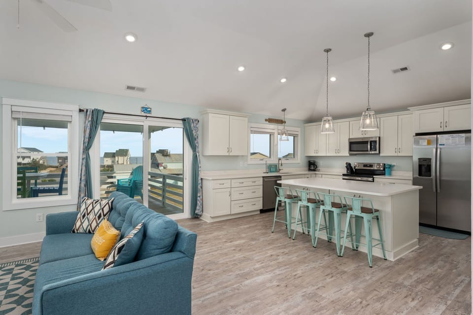 KH152: Ocean Breeze | TL Living Area, Fireplace (Off-Season), Deck Access