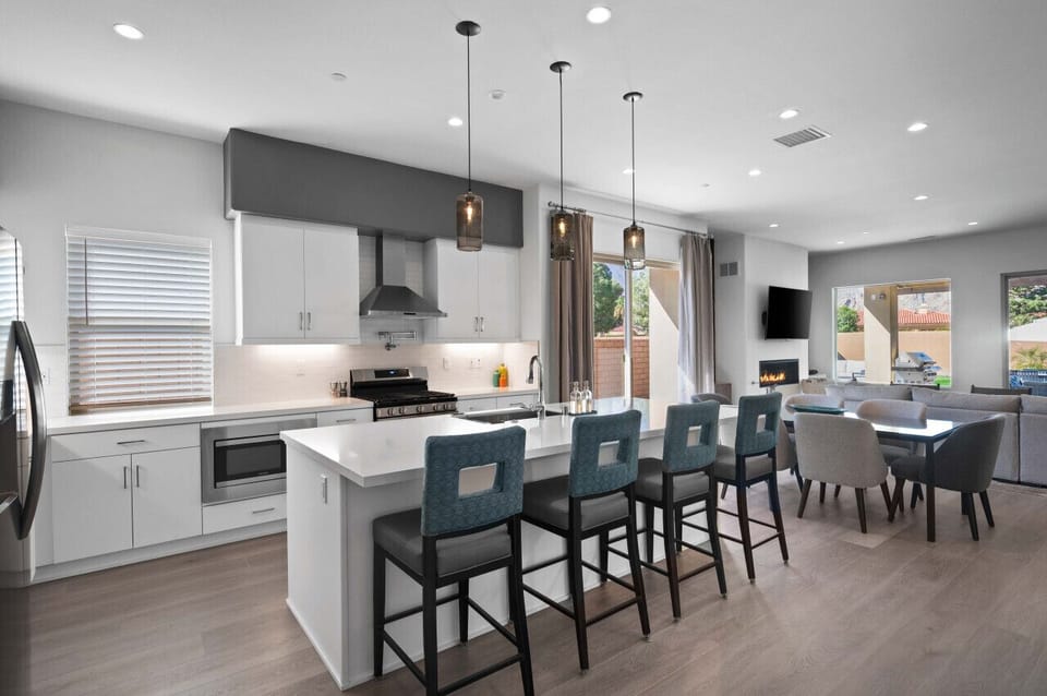 A sleek kitchen with a spacious island