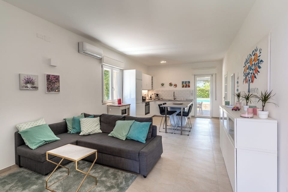 Basic Villa | Living area | 35-inch TV with digital channels
