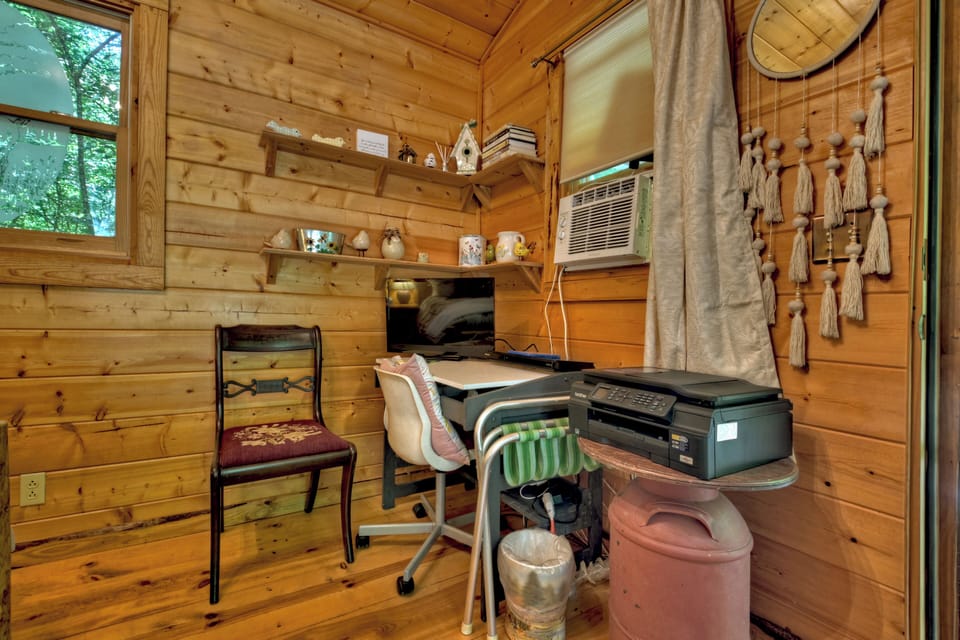 Desk area in the detached guest room at this pet-friendly cabin rental