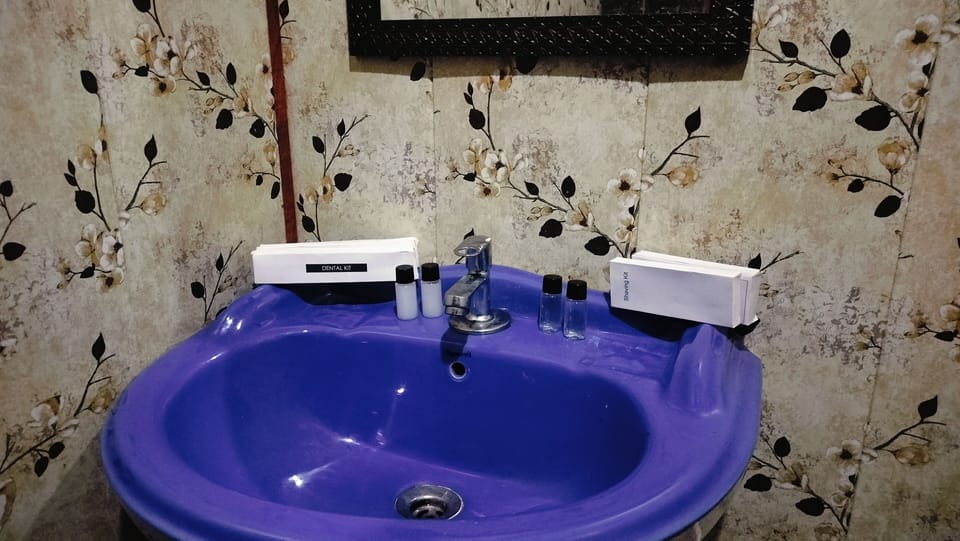 Deluxe Room | Bathroom | Shower, designer toiletries, slippers, bidet