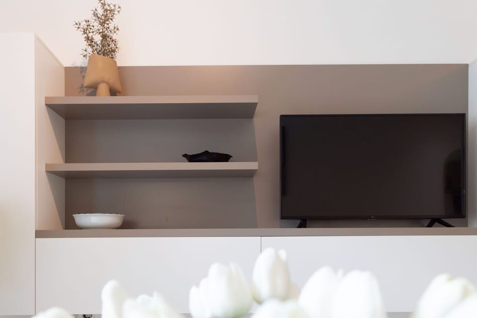 Premium Apartment, 1 Bedroom, Non Smoking, City View | Living area | 42-inch Smart TV with digital channels, streaming services
