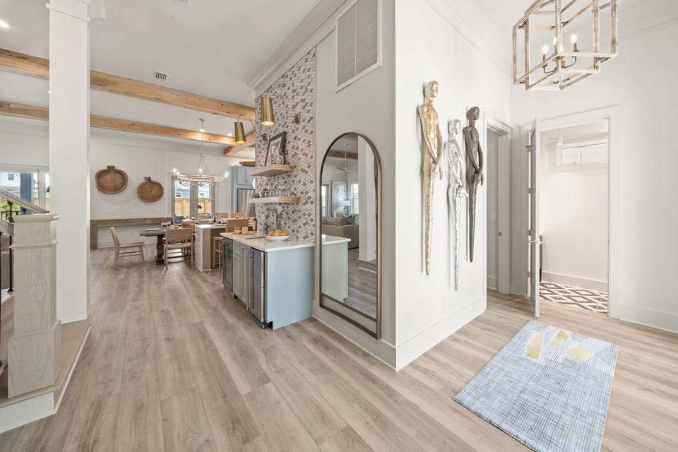 1st Floor Entrance with Wet Bar, Laundry Room and Half Bath to the right of front door
