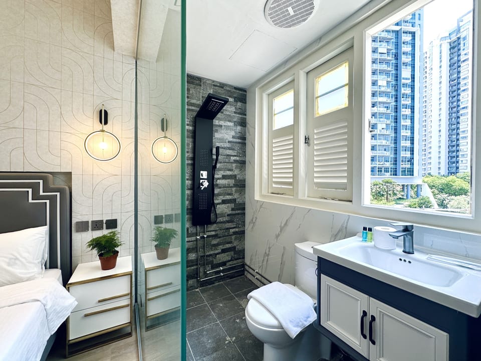 Standard Single Room | Bathroom | Shower, free toiletries, hair dryer, slippers