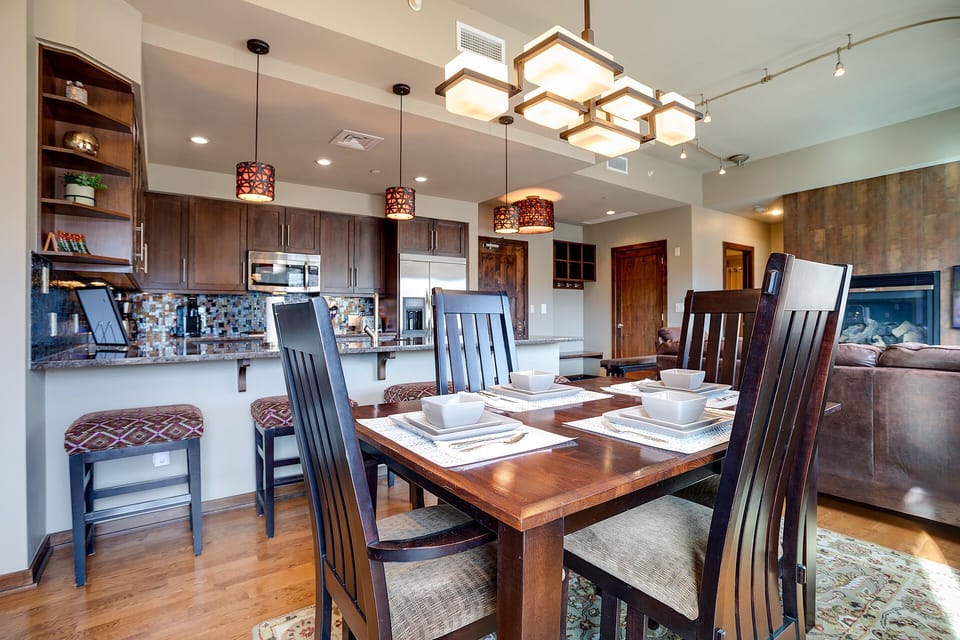Gather around your elegant dining table for memorable meals, with the open kitchen making entertaining effortless and enjoyable.