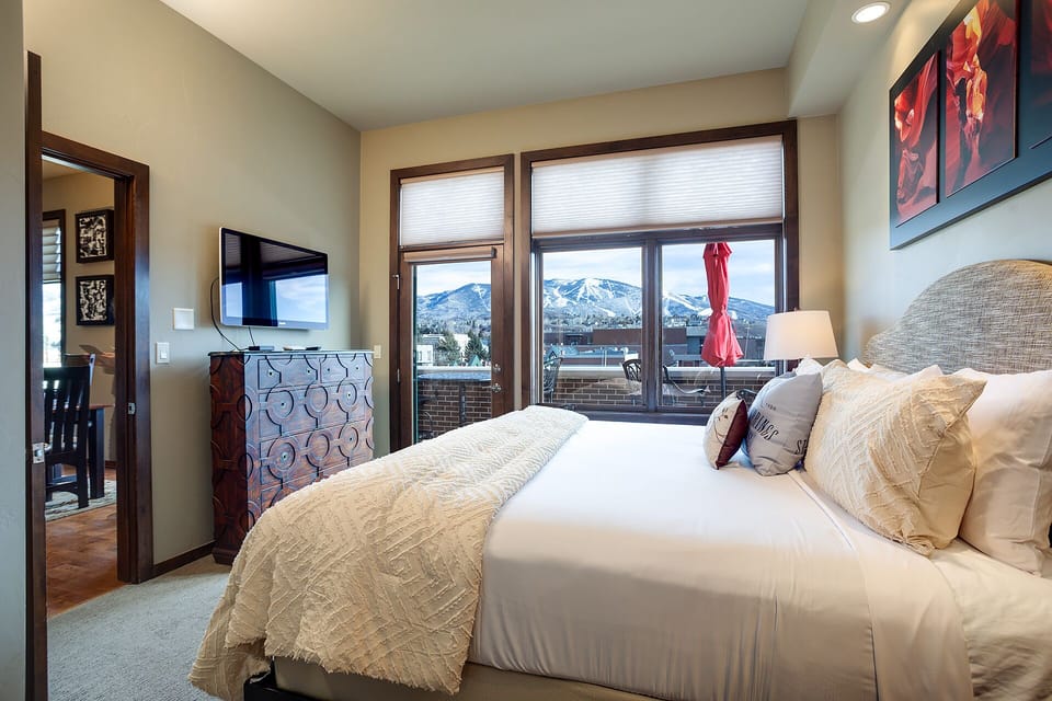 Wake up to breathtaking mountain views framed by your bedroom windows. Sink into plush linens and unwind with your favorite shows before heading out to explore.