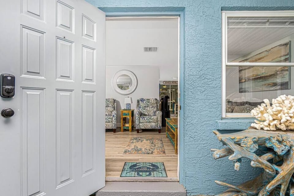 Head into the front lanai to enter the front door 