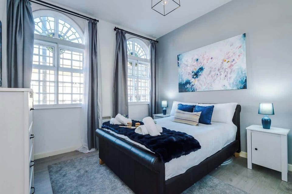 Bedroom 1 benefits from a comfortable double bed, a 40-inch TV and plenty of storage.