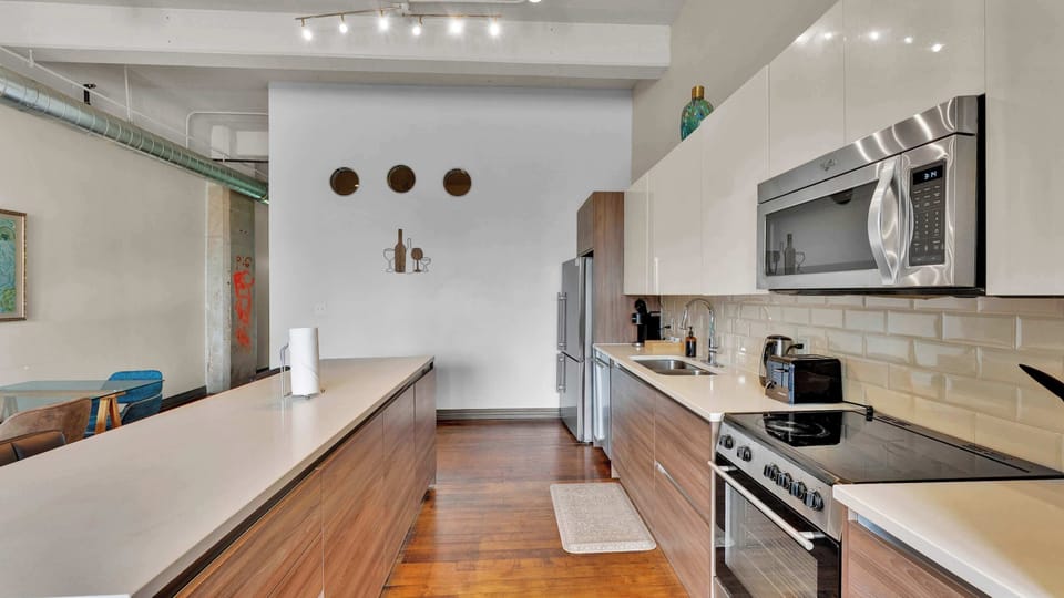 Gourmet Kitchen: Sleek design with modern appliances - cook up a Texas feast with style!