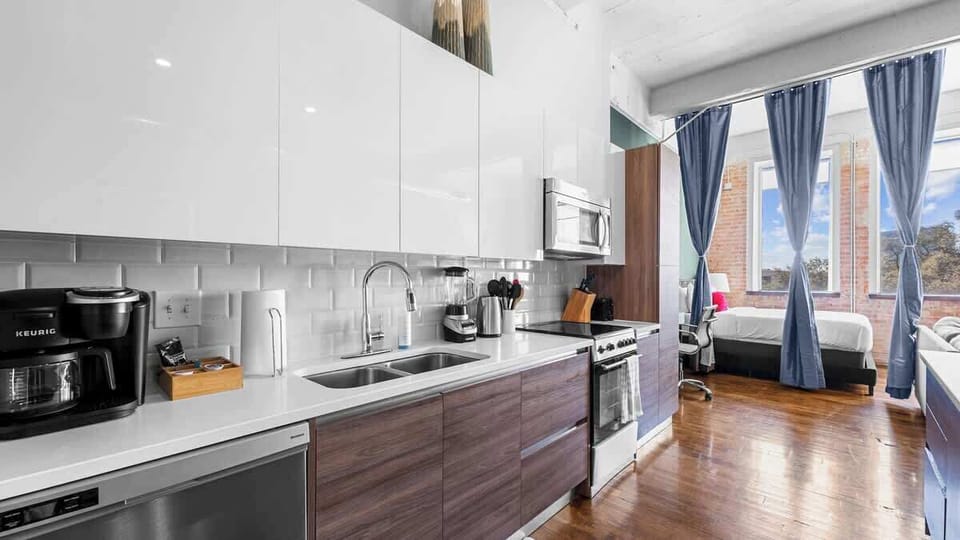 Urban Oasis Kitchen & Living: Sleek details and vibrant decor await your culinary adventures!