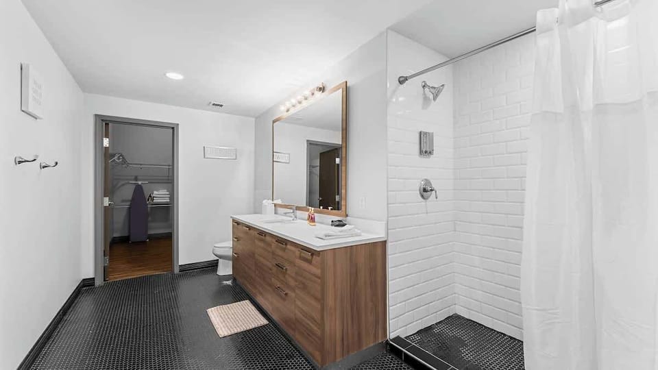 Spa-Like Bathroom: Indulge in modern luxury with a spacious vanity and sleek walk-in shower!