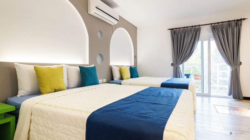 Deluxe Quadruple Room | Individually furnished, blackout drapes, soundproofing, free WiFi