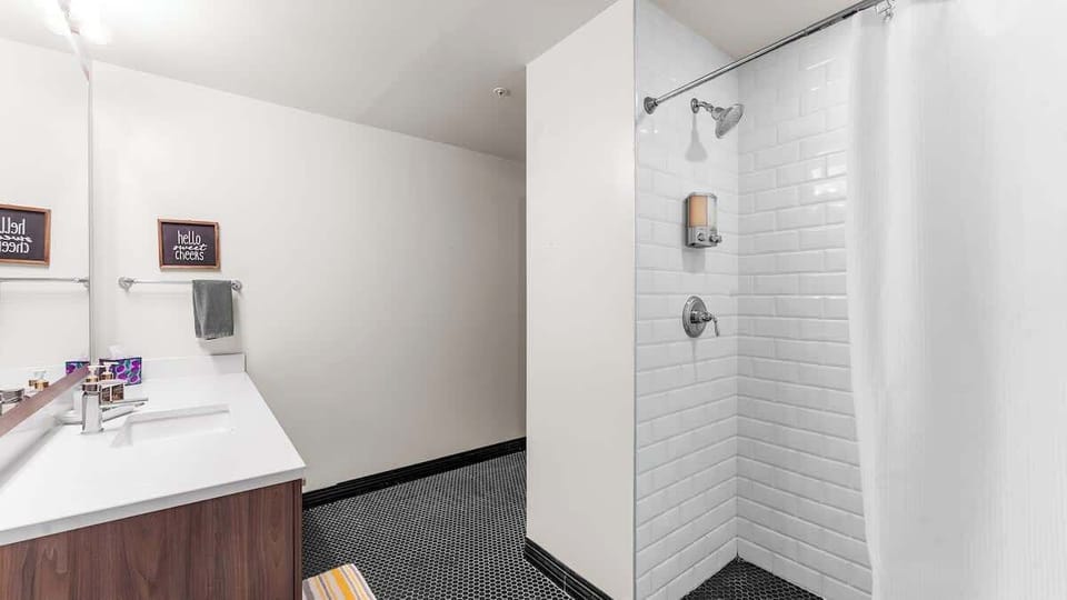  Elegant fixtures and stylish decor await your relaxation in this vibrant retreat.