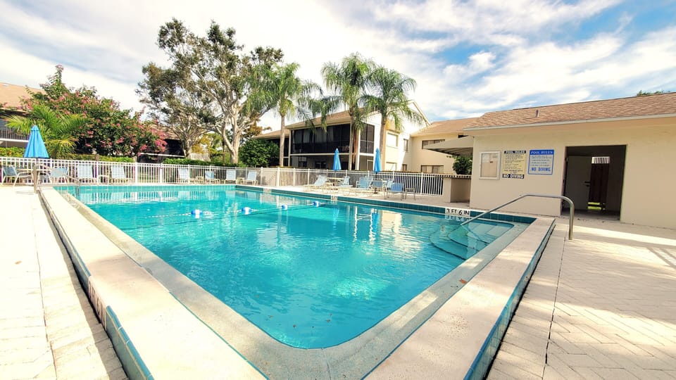 Pool area with new umbrellas and tables