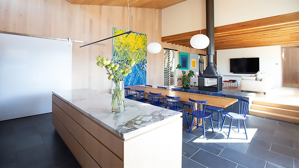 Dining area next to kitchen and main living room