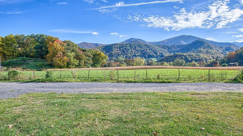 Gaze out at the vast mountain vistas and pasture from the front porch. 