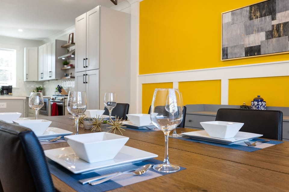 The large dining table has seating for 6 - with an additional 2 spots at the eat-in kitchen island. Enjoy a casual meal; or, if it's a special occasion, set the table and celebrate! 