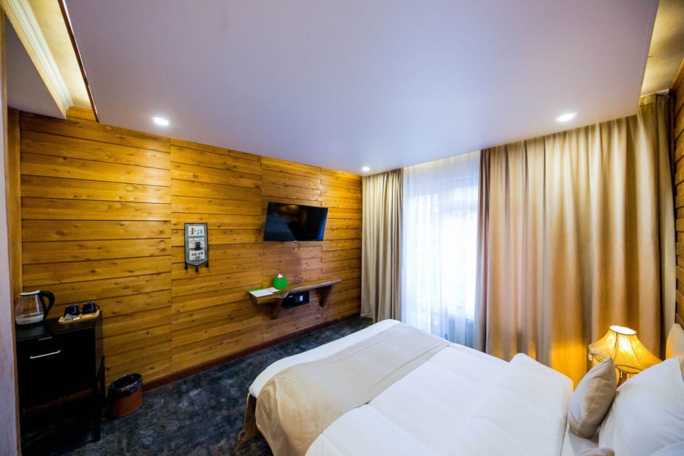 Blackout drapes, soundproofing, iron/ironing board, free WiFi