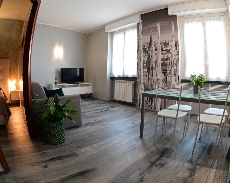 Comfort Apartment | Living area | TV