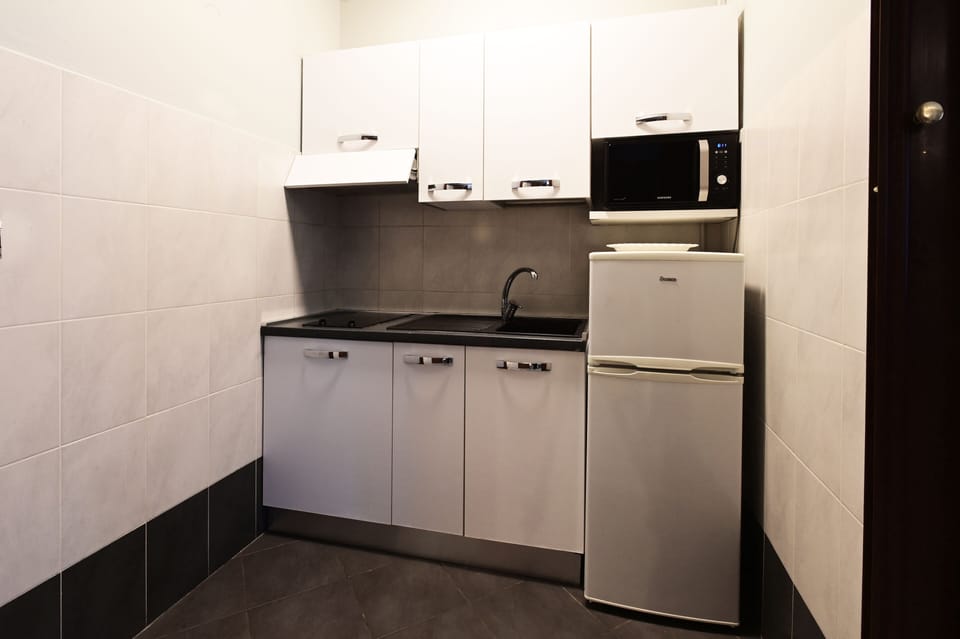 Fridge, microwave, cookware/dishes/utensils, freezer