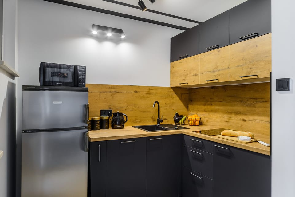 Apartment | Private kitchenette | Fridge, oven, stovetop, dishwasher