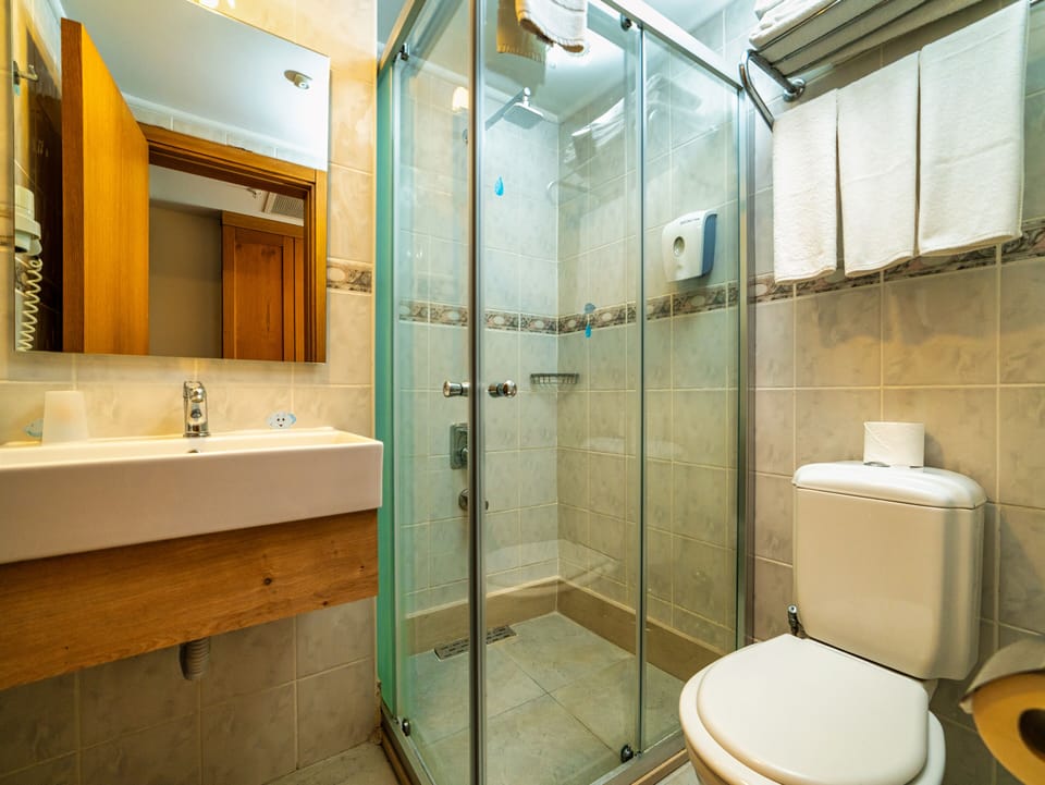 Shower, free toiletries, bathrobes, slippers