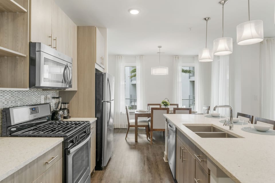Ample Kitchen Space with Stainless Steel Appliances