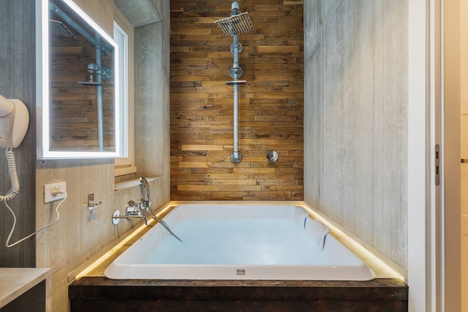 Luxury Studio Suite | Bathroom | Hair dryer, bathrobes, slippers, bidet
