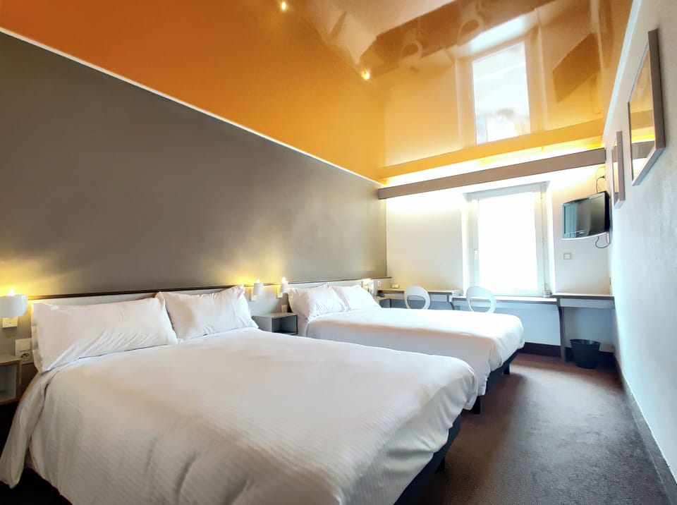 Quadruple Room | Bathroom | Bathtub, hair dryer, towels