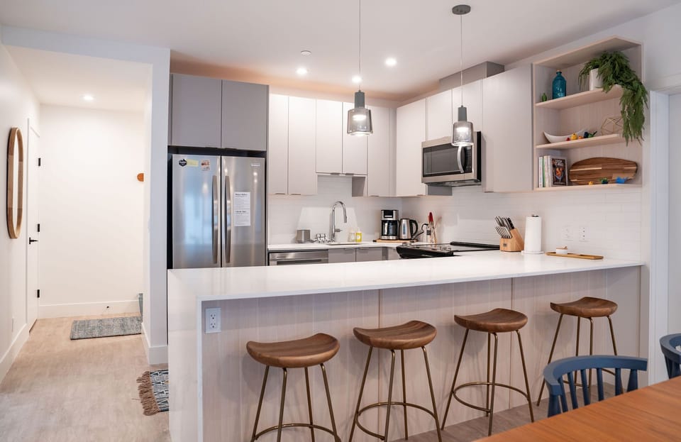 Condo | Private kitchen | Coffee/tea maker, full-size fridge, microwave, oven
