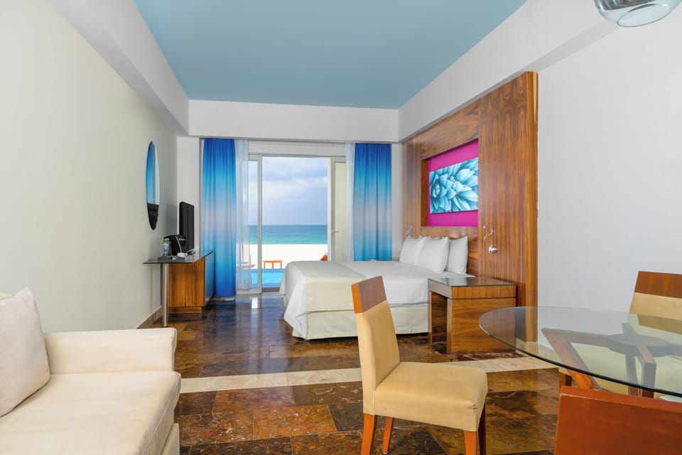 Altitude Junior Suite Swimout Ocean Front King | In-room safe, desk, blackout drapes, iron/ironing board