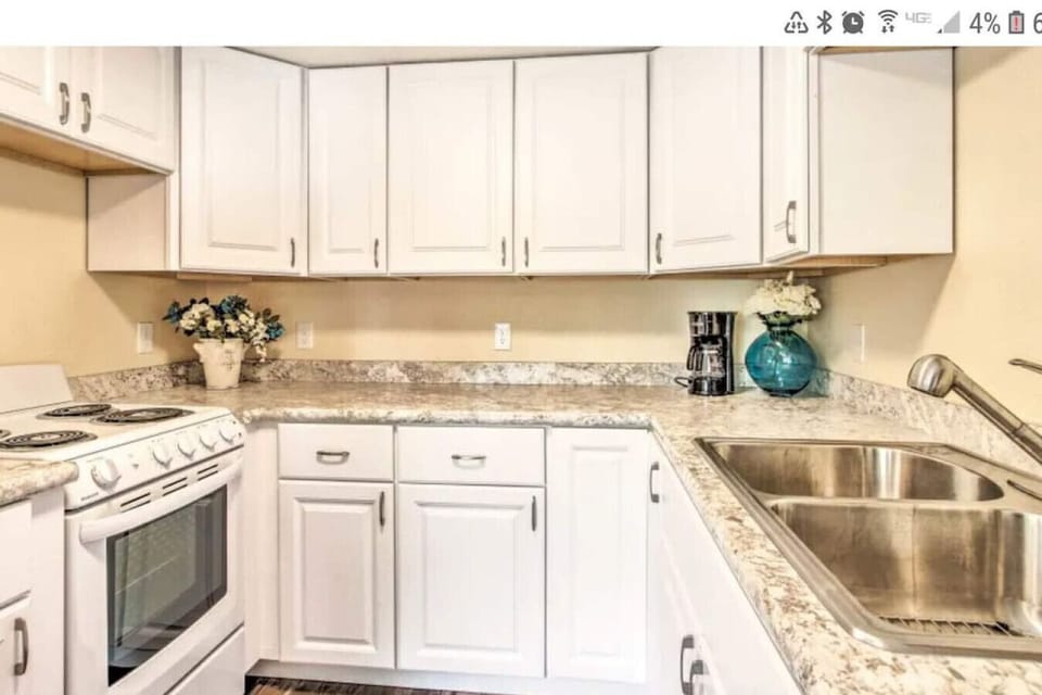 : Modern kitchen with all essentials - Designer Cottage by Wrecked & Refined