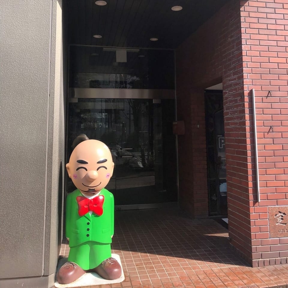 In front of the entrance