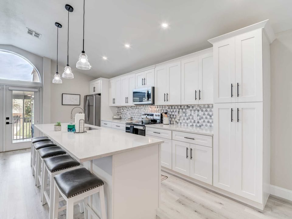 Newer updated modern. Dishwasher, microwave, range, and disposal. Plenty of cookware and dishes