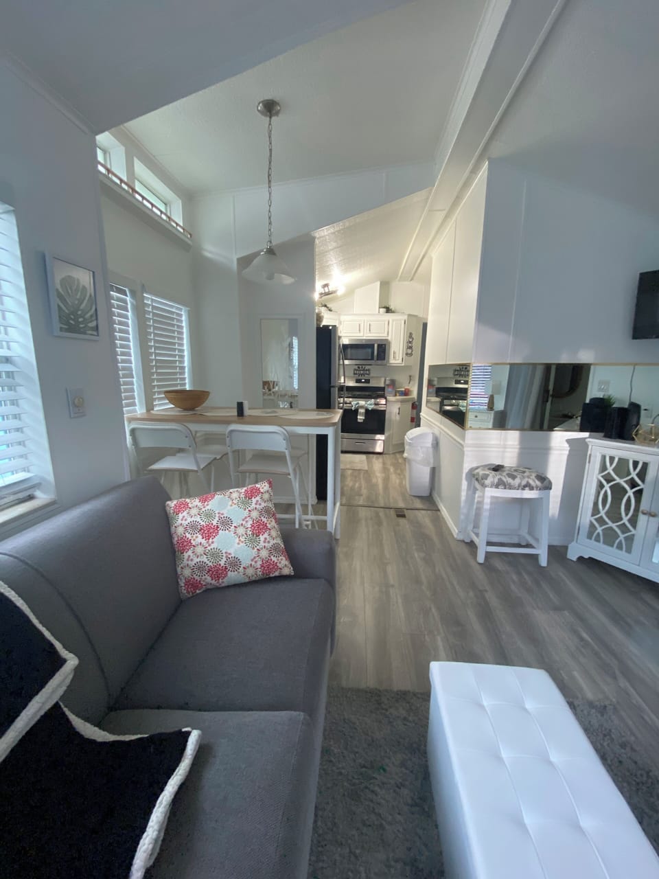 Living dining area. With views of the backyard and pool.