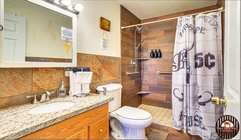 Bathroom is well appointed with all the amenities you'd expect and more!