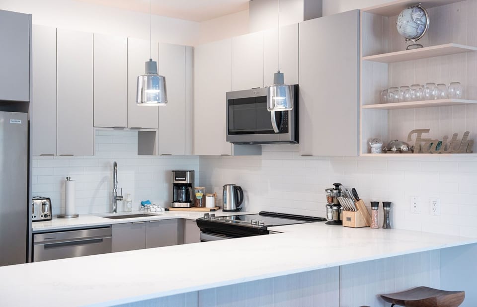 Condo, 2 Bedrooms | Private kitchen | Coffee/tea maker, full-size fridge, microwave, oven