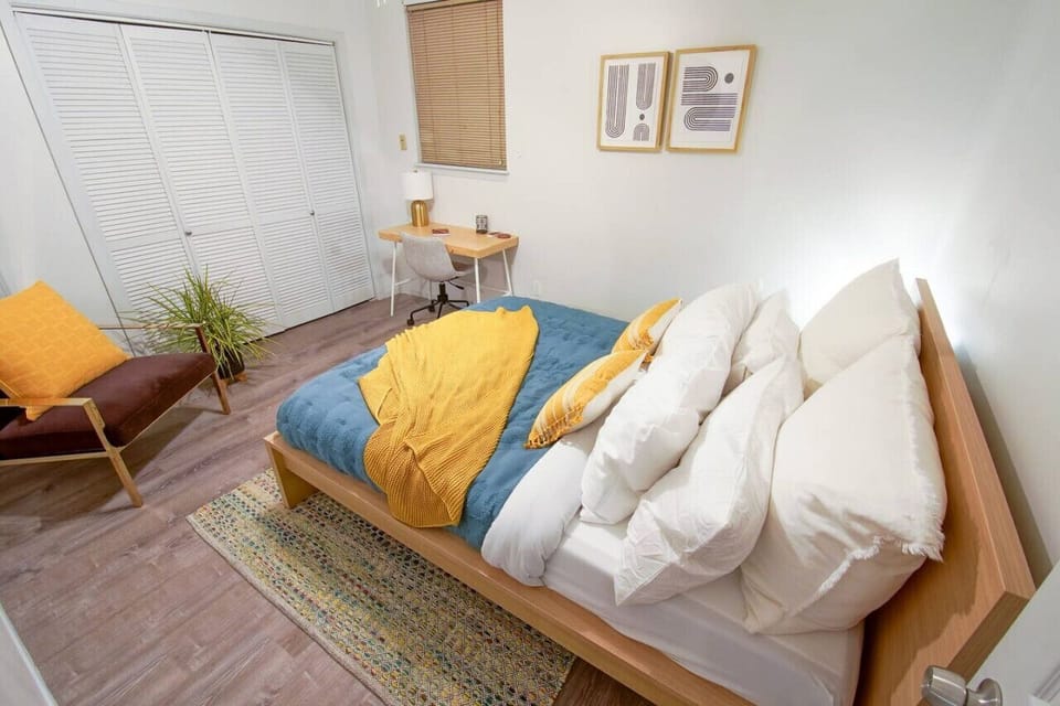 Rest and recharge in style in our spacious bedroom with a comfortable queen bed and ample workspace. Our apartment offers the perfect blend of relaxation and productivity, with plenty of closet space to keep you organized.