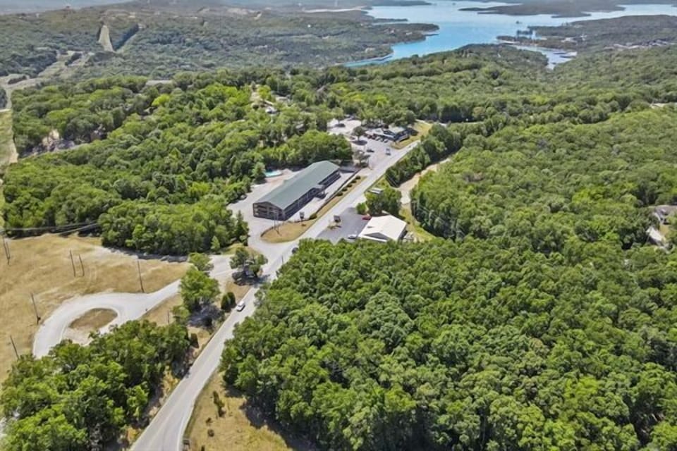 From above: a lodge wrapped in nature